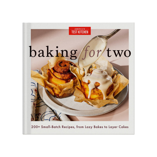 Cookbook titled 'Baking for Two' by America's Test Kitchen with a photo of a dessert on the cover.