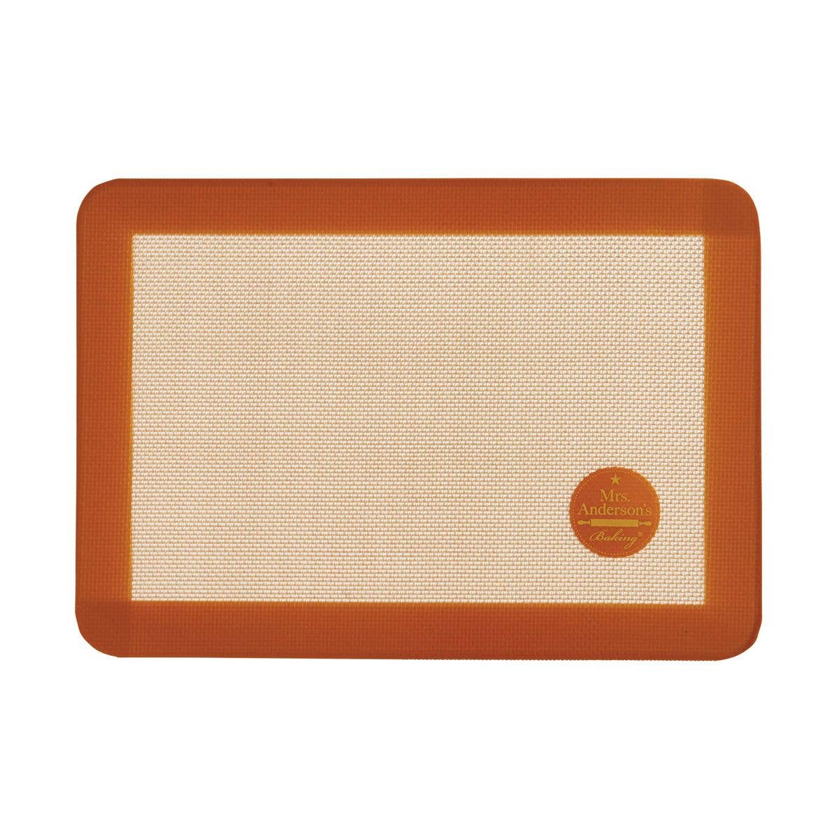 Silicone baking mat with brown border on a white background