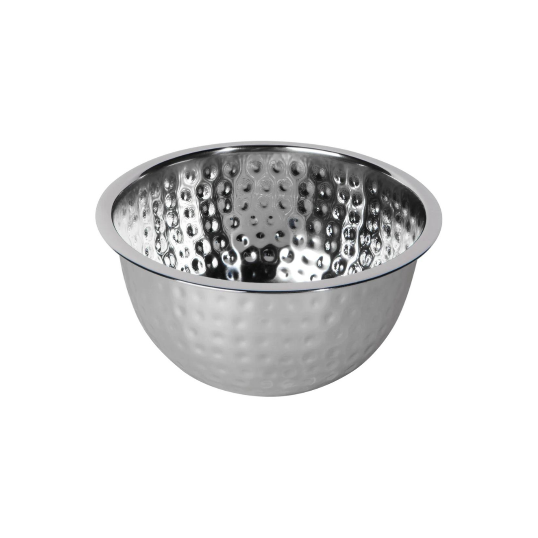 These steel mixing bowls have a hammered effect, adding to their timeless appeal. They are durable and practical for everyday use in the kitchen, while also bringing a touch of global flair to your countertop. Danica Heirloom's handmade and ethically produced collection offers unique tones and textures for your home.