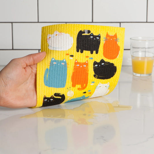 Add a touch of feline fun to your household chores with the inquisitive cats printed on this Purrfect Pals Swedish dishcloth by Ecologie. The biodegradable and earth-friendly sponge cloth is a colorful, reusable alternative to paper towels