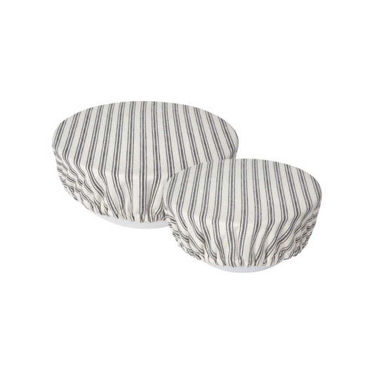 Ticking Stripe Bowl Covers provide an eco-friendly way to store leftovers, or cover bowls. The set of 2 reusable bowl covers are lined with a moisture barrier that helps to keep food fresher for longer, while eliminating the need for single-use plastic wrap. To clean, just remove and put in the washing machine. Save time, effort, and resources with every use.