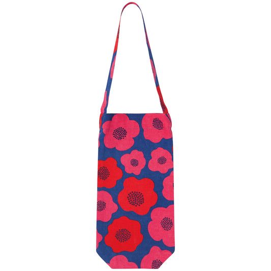 Gift a bottle of wine in the vibrant, floral beauty of the Happy Hour Poppy wine bag! Bursting with bold reds, petal pinks, and refreshing blues, this eye-catching design adds a pop of color and charm to any occasion. Perfect for impressing even the most discerning wine lovers, it’s the ideal way to celebrate with style and a touch of floral fun. Cheers to a beautiful gift!